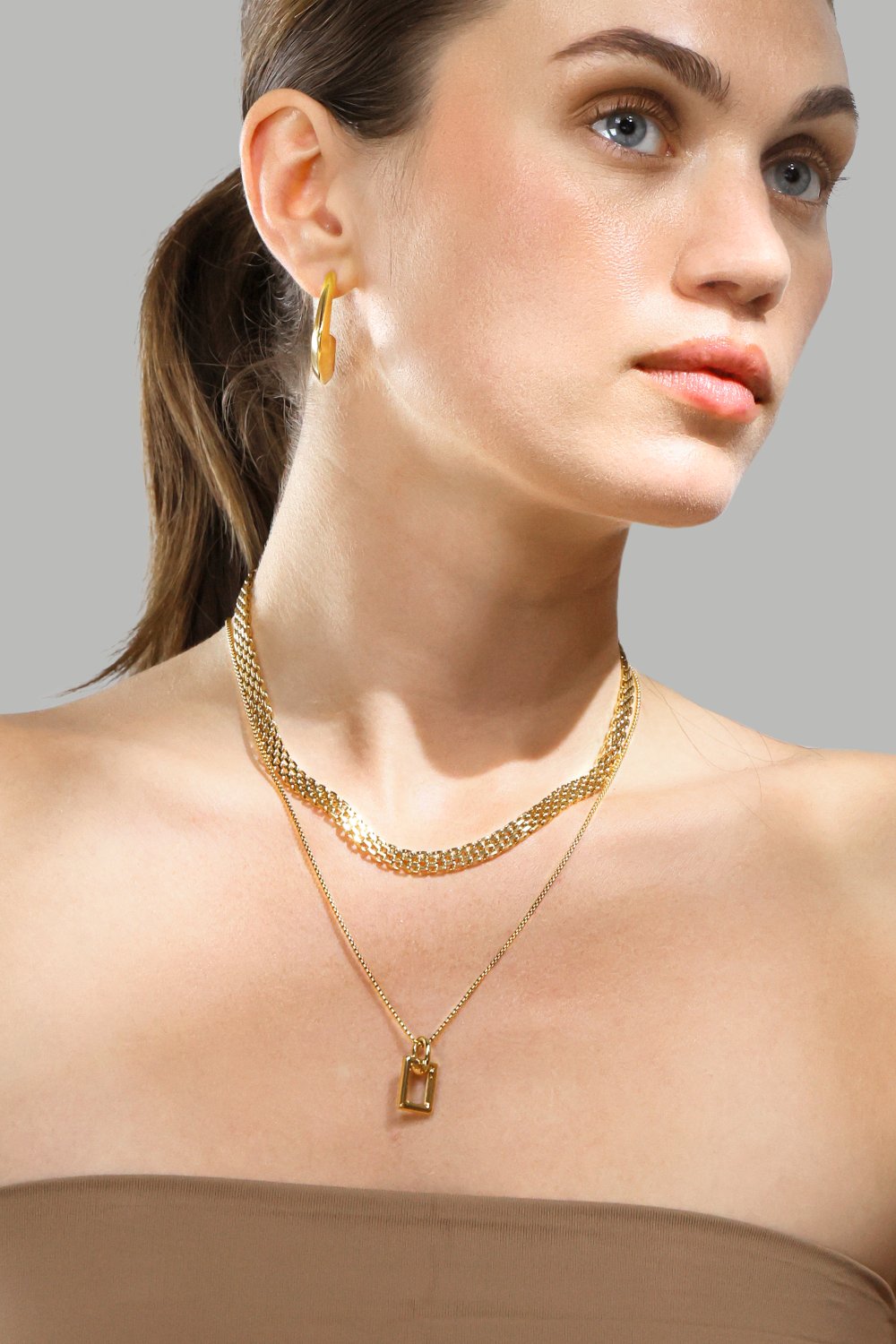 Øredobber Bold Curve – 18k Gullbelagte