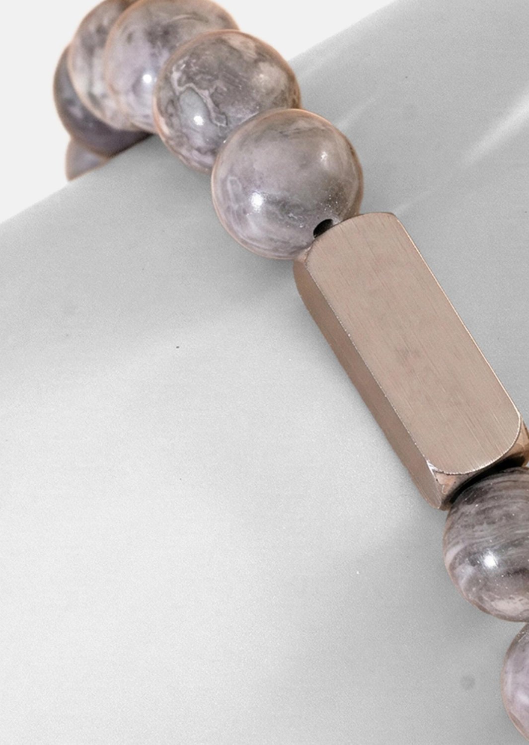 Perlearmbånd Stone Surface